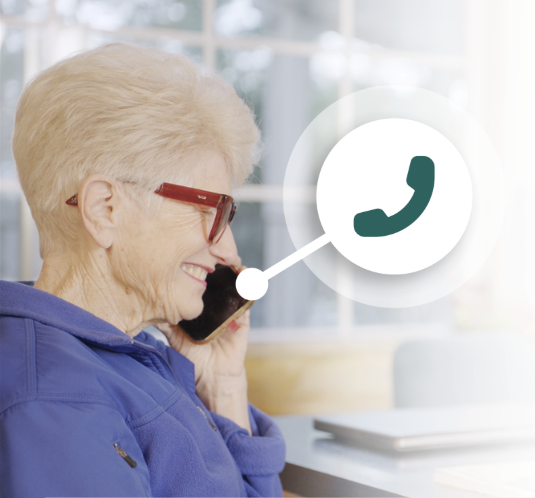 A woman speaking with a Moneta specialist by phone at home